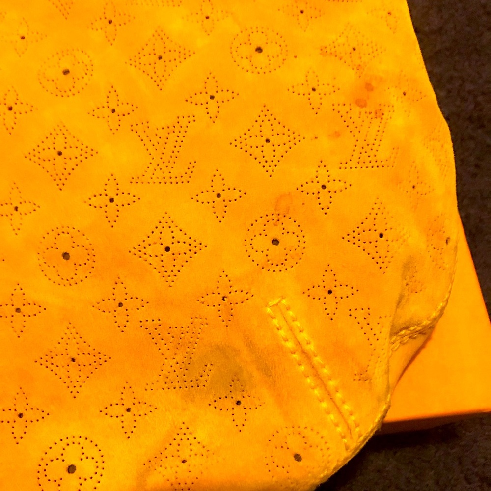 Authentic Have a few minor stains